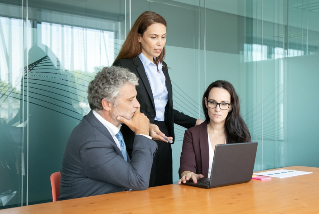 Managers providing feedback to an employee